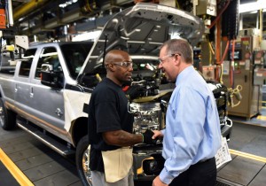 Joe Hinrichs (right), executive vice president and president, The Americas, Ford Motor Company tours the assembly line of the Kentucky Truck Plant.