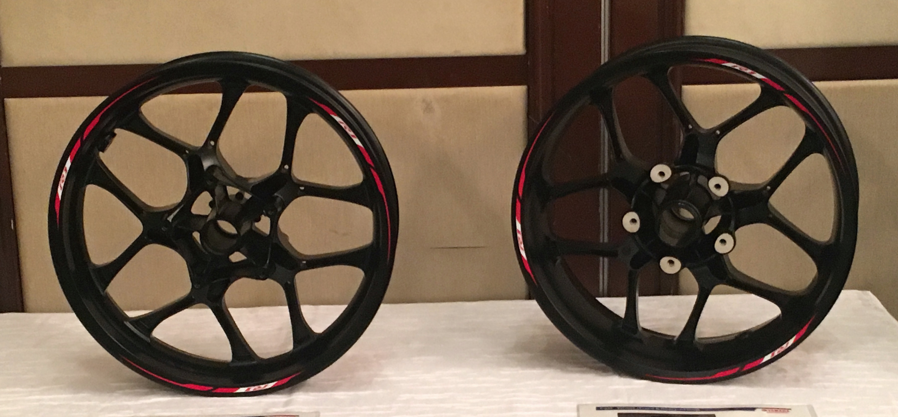 Front and rear wheels for super-sport motorcycles. 