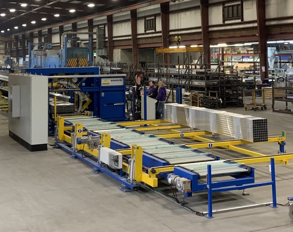 Figure 4. Pries employees operate the emmebi automated packing lines.