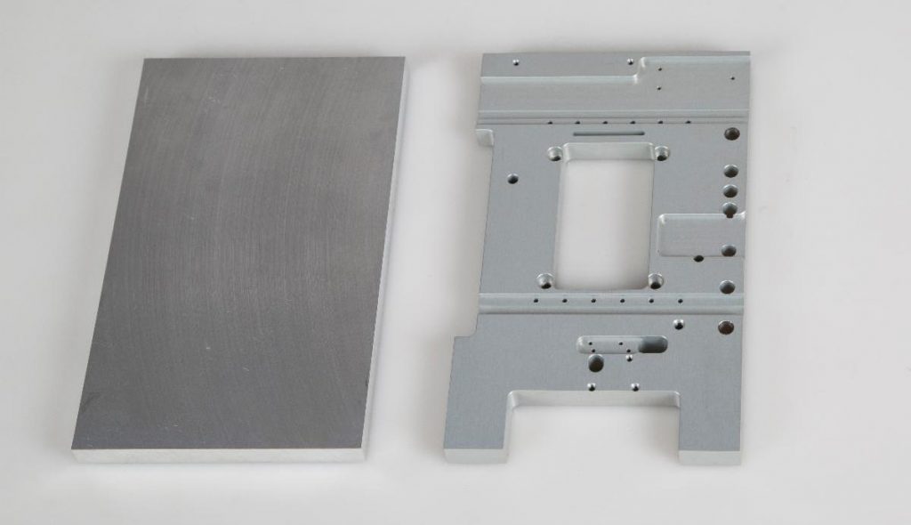 Machine-ready blanks (left) eliminate the need for squaring up the material prior to finishing the part (right). Flatness is especially important as it eliminates the tendency for movement during the machining process, especially with large surface area parts.