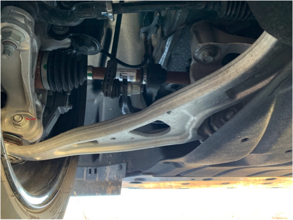 Figure 1. An aluminum front lower control arm on the 2021 Ford Mustang Mach-E. 