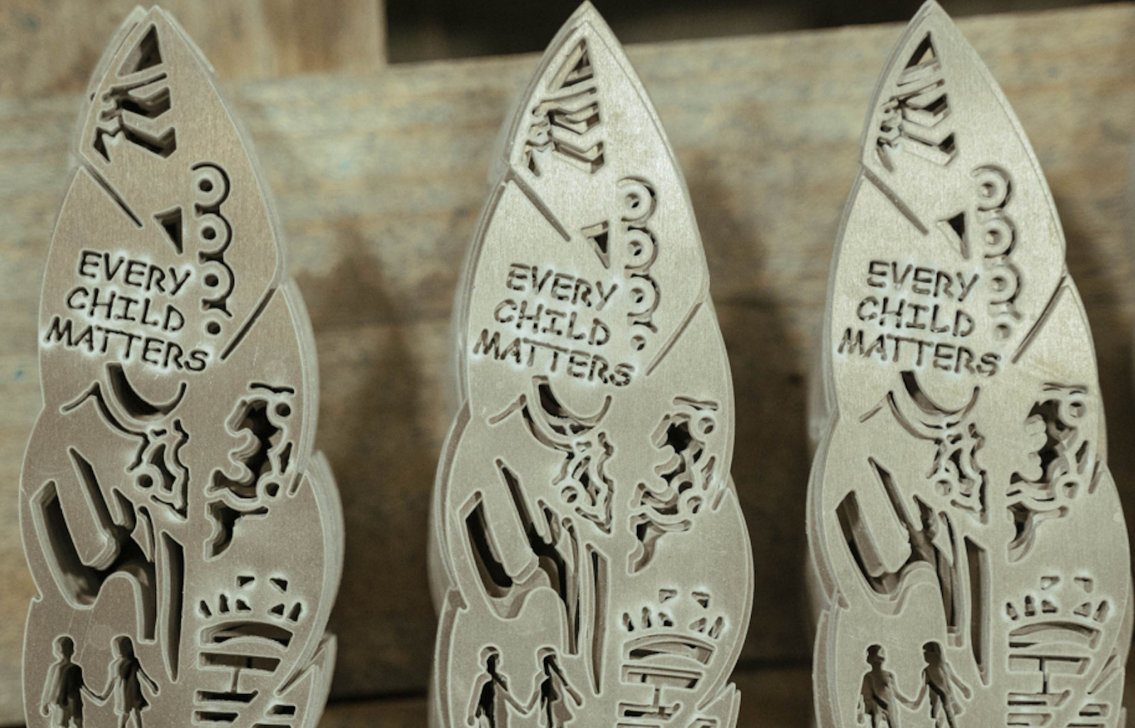 Aluminum Feathers Commemorate Children with Unmarked Graves Light