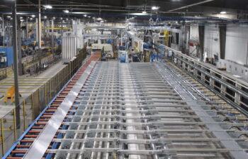 The cooling table and automated stretcher on the new press line at Alexandria.