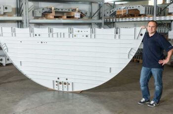 cover image - an aluminum plate machined for RUag Aerostructures