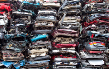 Figure 1. EOL cars that have been compacted in preparation for shredding and recycling.