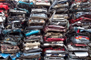 Figure 1. EOL cars that have been compacted in preparation for shredding and recycling.