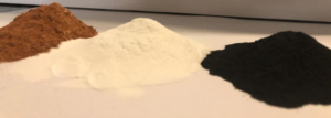 Figure 5. Three products extracted from red mud using the Alumtek process (L-R): a supplementary cementitious material (SCM) used in cement as an alternative for fly ash or replacement for a percentage of clinker, aluminum hydroxide, and iron oxide. (Source: Alumtek Minerals.)
