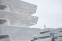 Stacks of aluminum ingots marked with Century Aluminum logo