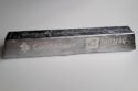 Aluminum ingot stamped with the logos and company names for Constellium and TARMAC Aerosave