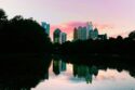 view of Atlanta skyline reflected in the water of a river