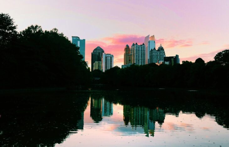 view of Atlanta skyline reflected in the water of a river