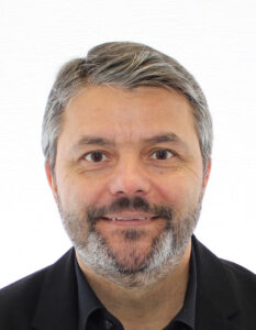 Headshot of a man with a beard.