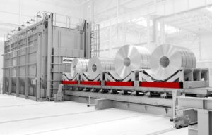 Photo of industrial aluminum coil equipment with edited background to make it a neutral location.