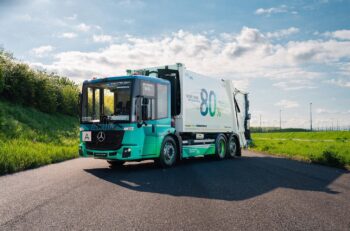An industrial truck with the Hydro logo on the side