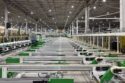 A view of the cooling tables and stretcher area of an extrusion press line.