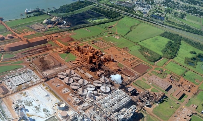 Aerial view of an alumina refinery with bauxite residue ponds.