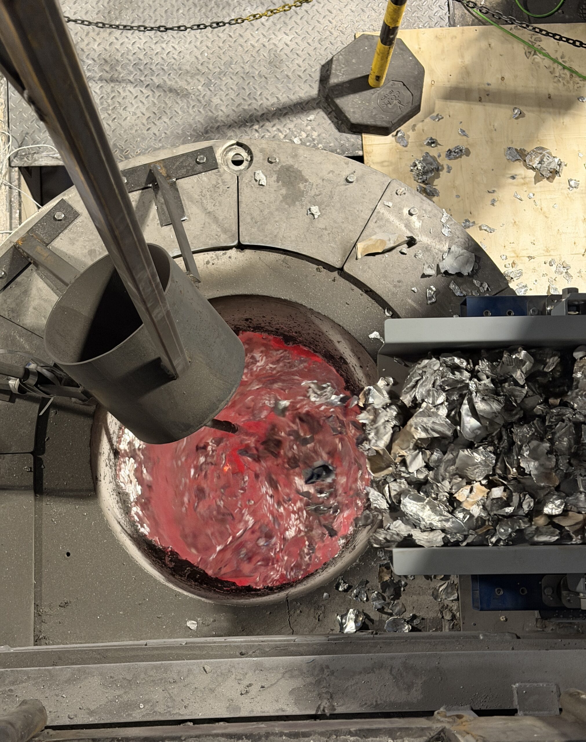 Molten aluminum being stirred.